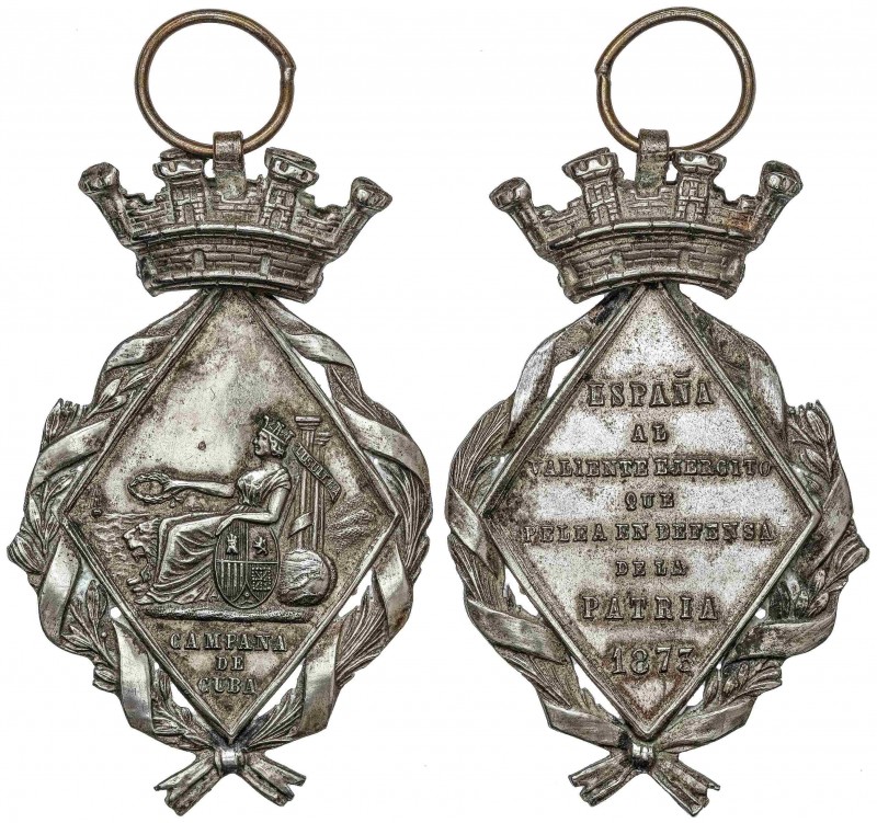 SPANISH DECORATIONS
Campaña de Cuba. 1873. Metal blanco. Con corona y anilla. P...