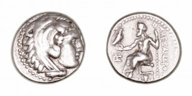 Reino Macedonio
Alejandro Magno
Dracma. AR. Traelium. (336-323 a.C.). A/Cabeza de Hércules con piel de león a der. R/Zeus entronizado a izq., monogr...