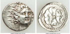 CARIAN ISLANDS. Rhodes. Ca. 84-30 BC. AR drachm (19mm, 4.15 gm, 1h). AU, flan flaw, scuffs. Radiate head of Helios facing, turned slightly right, hair...