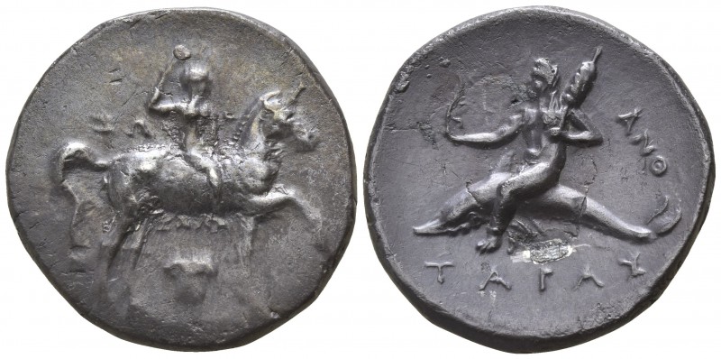 Calabria. Tarentum 280-272 BC.
Nomos AR

21mm., 6,46g.

ΣΩ, ΧΑΛΟ, youth on ...