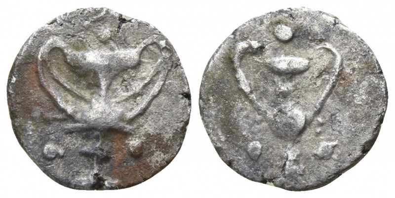 Calabria. Tarentum 280-228 BC.
Litra AR

9mm., 0,38g.

Kantharos; three pel...