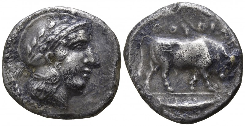 Lucania. Thurii 443-400 BC.
Nomos AR

20mm., 7,09g.

Helmeted head of Athen...