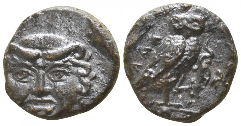 Sicily. Kamarina circa 420-405 BC.
Tetras AE

12mm., 12g.

Gorgoneion facin...