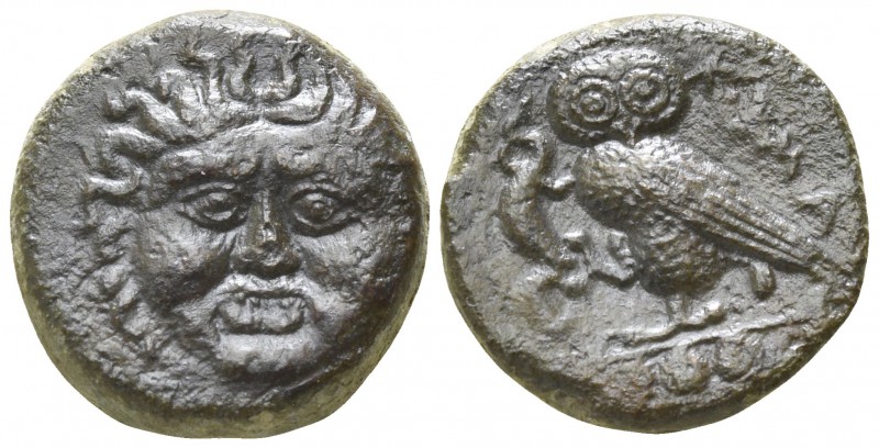 Sicily. Kamarina circa 420-405 BC.
Tetras AE

15mm., 3,61g.

Facing gorgone...