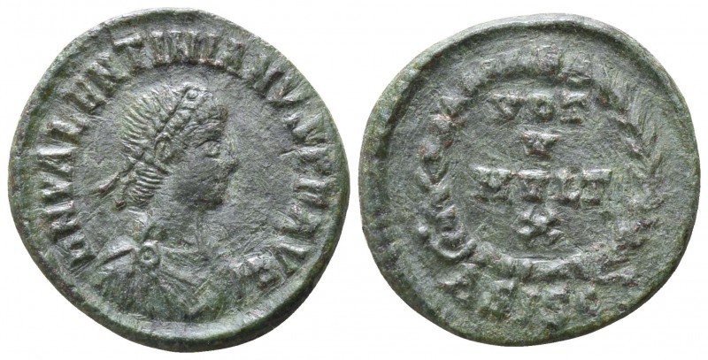 Valentinian II AD 375-392. Siscia
Follis Æ

15mm., 1,55g.

DN VALENTINIANVS...