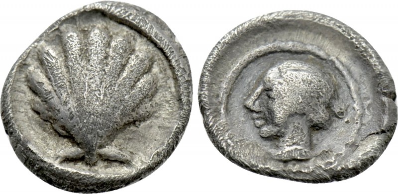CALABRIA. Tarentum. Litra (Circa 450-430 BC). 

Obv: Scallop shell.
Rev: Head...