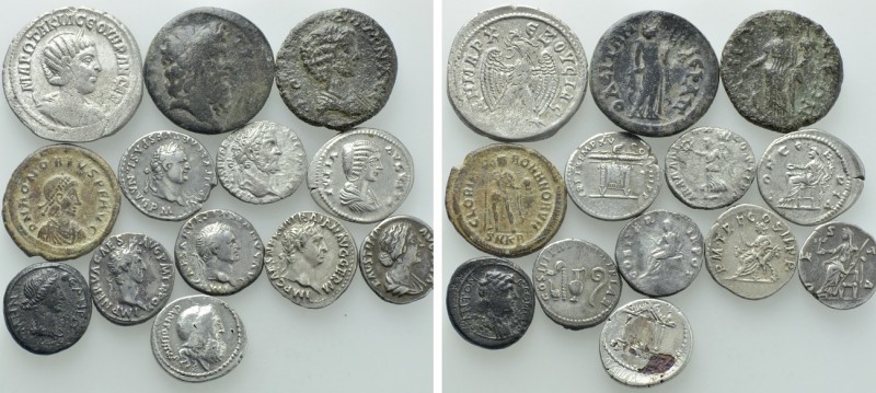 13 Roman Coins; Titus, Trajan etc. 

Obv: .
Rev: .

. 

Condition: See pi...
