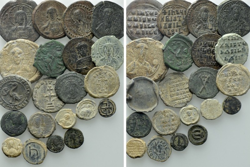 21 Byzantine Coins and Seal; Including an Imperial Seal of Isaac I Comnenus. 
...