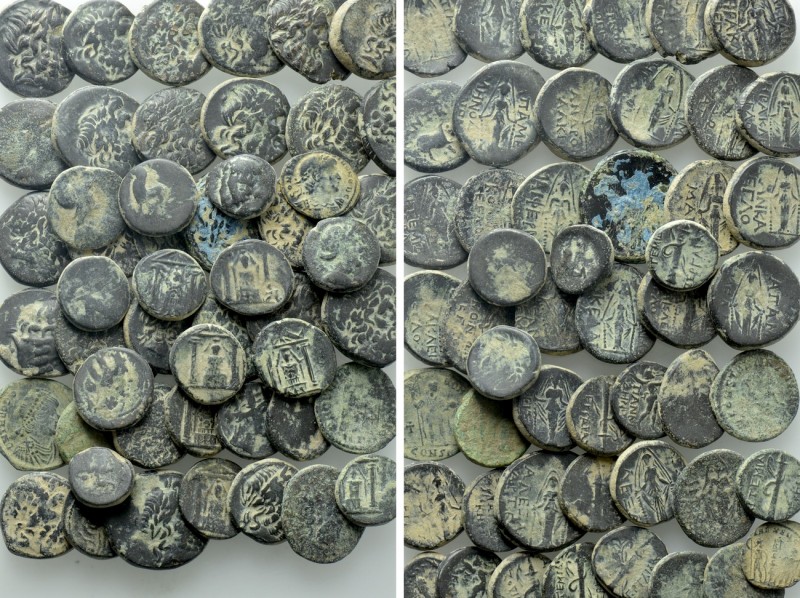 Circa 50 Greek and Roman Coins. 

Obv: .
Rev: .

. 

Condition: See pictu...