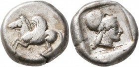 AKARNANIA. Leukas. Circa 470-450 BC. Stater (Silver, 18 mm, 8.64 g, 11 h). Λ Bridled Pegasus, with curved wing, flying left. Rev. Head of Athena to ri...