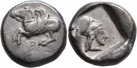 CORINTHIA. Corinth. Circa 500-450 BC. Stater (Silver, 18 mm, 8.10 g, 3 h). Ϙ Bridled Pegasos, with curved wing, flying left. Rev. Head of Athena to ri...