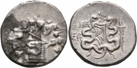 IONIA. Ephesos. Circa 180-67 BC. Cistophorus (Silver, 25 mm, 12.31 g, 12 h), CY 45 = 90/89. Cista mystica from which snake coils; around, ivy wreath w...