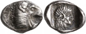 CARIA. Knidos. Circa 500 BC. Trihemiobol (Silver, 13 mm, 1.79 g, 12 h). Forepart of a roaring lion to right. Rev. Head of Aphrodite to right, wearing ...