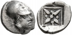 IONIA. Uncertain. 5th century BC. Hemiobol (Silver, 8 mm, 0.36 g). Head of Athena to right, wearing Corinthian helmet. Rev. Floral or stellar pattern;...