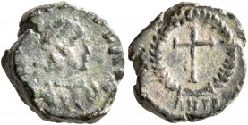 Theodosius II, 402-450. Nummus (Bronze, 12 mm, 1.92 g, 5 h), Antiochia, 425-435. [D N THEODOSIVS P F AVG] Diademed, draped and cuirassed bust of Theod...