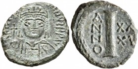 Justinian I, 527-565. Dekanummium (Bronze, 18 mm, 2.43 g, 6 h), Ravenna, RY 35 = 561/2. D N IVSTINIANVS P P AV Helmeted and cuirassed bust of Justinia...