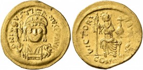 Justin II, 565-578. Solidus (Gold, 20 mm, 4.43 g, 6 h), Constantinopolis, 566/7-578. D N IVSTINVS P P AVI Helmeted and cuirassed bust of Justin II fac...