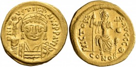 Justin II, 565-578. Solidus (Gold, 20 mm, 4.47 g, 6 h), Constantinopolis. D N IVSTINVS P P AVI Helmeted and cuirassed bust of Justin II facing, holdin...