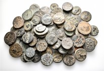 A lot containing 75 bronze coins. All: Roman Provincial. Fine to very fine. LOT SOLD AS IS, NO RETURNS. 75 coins in lot.