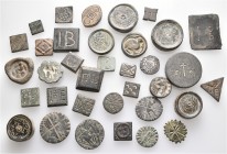 A lot containing 2 silver and 33 bronze weights. All: Byzantine or early Islamic. Fine to good very fine. LOT SOLD AS IS, NO RETURNS. 35 weights in lo...
