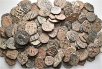 A lot containing 159 bronze coins. Includes: Byzantine and Arab-Byzantine Folles. Fine to very fine. LOT SOLD AS IS, NO RETURNS. 159 coins in lot.