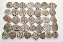 A lot containing 36 bronze coins. All: Arab-Byzantine. Very fine to good very fine. LOT SOLD AS IS, NO RETURNS. 36 coins in lot.