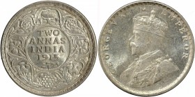 British India
Annas 2 (Silver)
Annas 02 
Silver Two Annas Coin of King George V of Calcutta Mint of 1915.
1915, King George V, Silver 2 Annas, Cal...