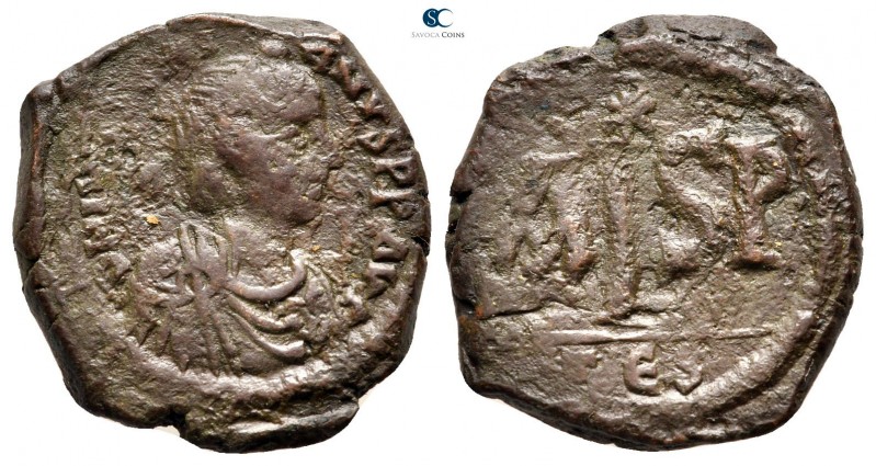 Justinian I AD 527-565. Thessalonica
16 Nummi Æ

24 mm., 6,83 g.



nearl...