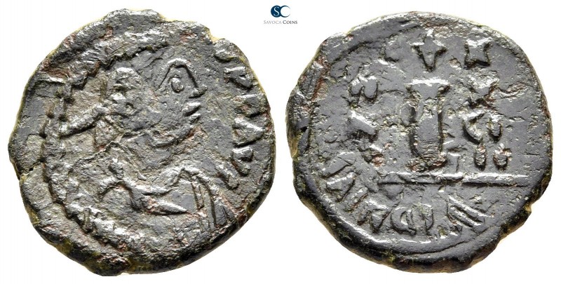 Justinian I AD 527-565. Uncertain mint
Decanummium Æ

18 mm., 2,81 g.



...