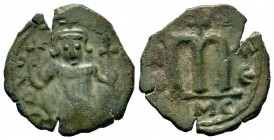 ARAB-BYZANTINE, Rashidun Caliphate, AE fals, c. 637-643. 
Condition: Very Fine

Weight:3,96 gr
Diameter: 21,30 mm