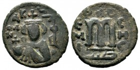 ARAB-BYZANTINE, Rashidun Caliphate, AE fals, c. 637-643. 
Condition: Very Fine

Weight: 4,03gr
Diameter: 19,85 mm