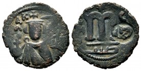 ARAB-BYZANTINE, Rashidun Caliphate, AE fals, c. 637-643. 
Condition: Very Fine

Weight: 3,91 gr
Diameter: 20,85 mm