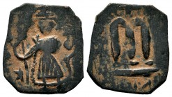 ARAB-BYZANTINE, Rashidun Caliphate, AE fals, c. 637-643. 
Condition: Very Fine

Weight:2,39 gr
Diameter: 19,70 mm