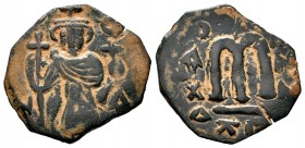 ARAB-BYZANTINE, Rashidun Caliphate, AE fals, c. 637-643. 
Condition: Very Fine

Weight: 3,06 gr
Diameter: 22,67 mm