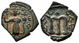 ARAB-BYZANTINE, Rashidun Caliphate, AE fals, c. 637-643. 
Condition: Very Fine

Weight: 2,43 gr
Diameter: 18 mm