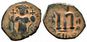 ARAB-BYZANTINE, Rashidun Caliphate, AE fals, c. 637-643. 
Condition: Very Fine

Weight:5,09gr
Diameter: 23,95 mm