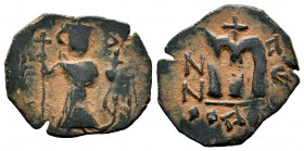 ARAB-BYZANTINE, Rashidun Caliphate, AE fals, c. 637-643. 
Condition: Very Fine

Weight: 2,89 gr
Diameter: 23,35 mm