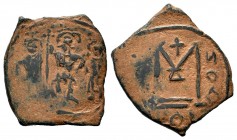 ARAB-BYZANTINE, Rashidun Caliphate, AE fals, c. 637-643. 
Condition: Very Fine

Weight: 3,88 gr
Diameter:20,45 mm