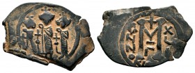 ARAB-BYZANTINE, Rashidun Caliphate, AE fals, c. 637-643. 
Condition: Very Fine

Weight: 5,01gr
Diameter:30,80 mm