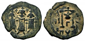 ARAB-BYZANTINE, Rashidun Caliphate, AE fals, c. 637-643. 
Condition: Very Fine

Weight: 3,96 gr
Diameter: 23,25 mm