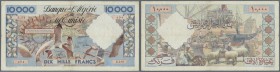 Algeria / Algerien. 10.000 Francs 1956, P.110, slightly stained paper with several folds and tiny holes at center. Condition: F