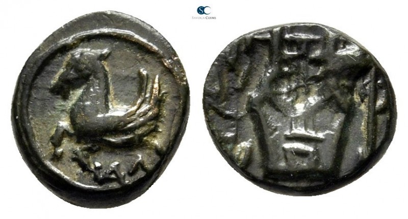 Caria. Halikarnassos 400-367 BC. 
Bronze Æ

8 mm., 0,76 g.

AΛ, forepart of...