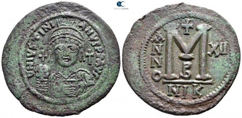 Justinian I AD 527-565. RY 12 (17/18). Nikomedia
Follis Æ

44 mm., 21,62 g.
...