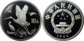 10 Yuan 1992 
Weltmünzen und Medaillen, China. Weisse Störche. 10 Yuan 1992, Silber. KM 454. Polierte Platte