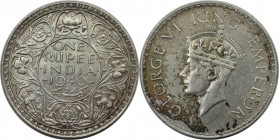 1 Rupee 1940 
Weltmünzen und Medaillen, Indien / India. Britisch Indien. Georg VI. (1936-1947). 1 Rupee 1940, Silber. KM 556. Stempelglanz
