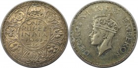 1 Rupee 1941 
Weltmünzen und Medaillen, Indien / India. Britisch Indien. Georg VI. (1936-1947). 1 Rupee 1941, Silber. KM 556. Stempelglanz