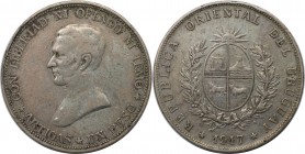 1 Peso 1917 
Weltmünzen und Medaillen, Uruguay. 1 Peso 1917, Silber. KM 23. Sehr Schön, Randfehler