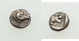 CARIA. Uncertain mint. Ca. 4th century BC. AR tetartemorion (6mm, 0.35 gm, 7h). VF. Ram head right / Forepart of roaring lion right. Troxell, "Carians...