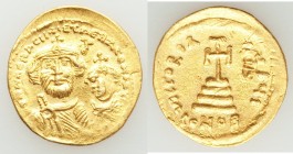 Heraclius (AD 610-641), and Heraclius Constantine. AV solidus (21mm, 4.45 gm, 7h). XF, countermark. Constantinople, 10th officina, ca. AD 616-625. dd ...
