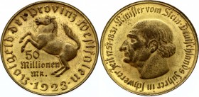 Germany - Weimar Republic Westphalia 50 Millionen Mark 1923 
J# N23a; F#645.12A (broad rim); Gold plated bronze 32.05g 44mm